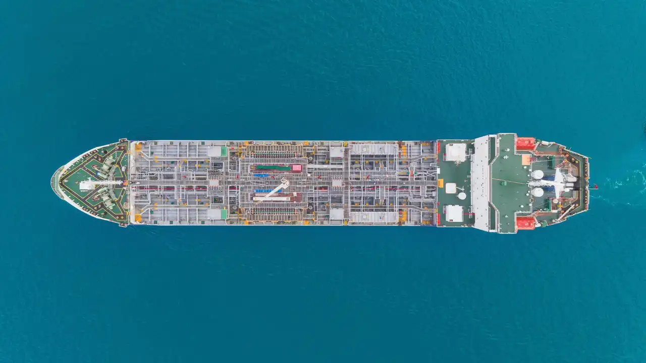 An aerial view of a products tanker underway in deep-blue water